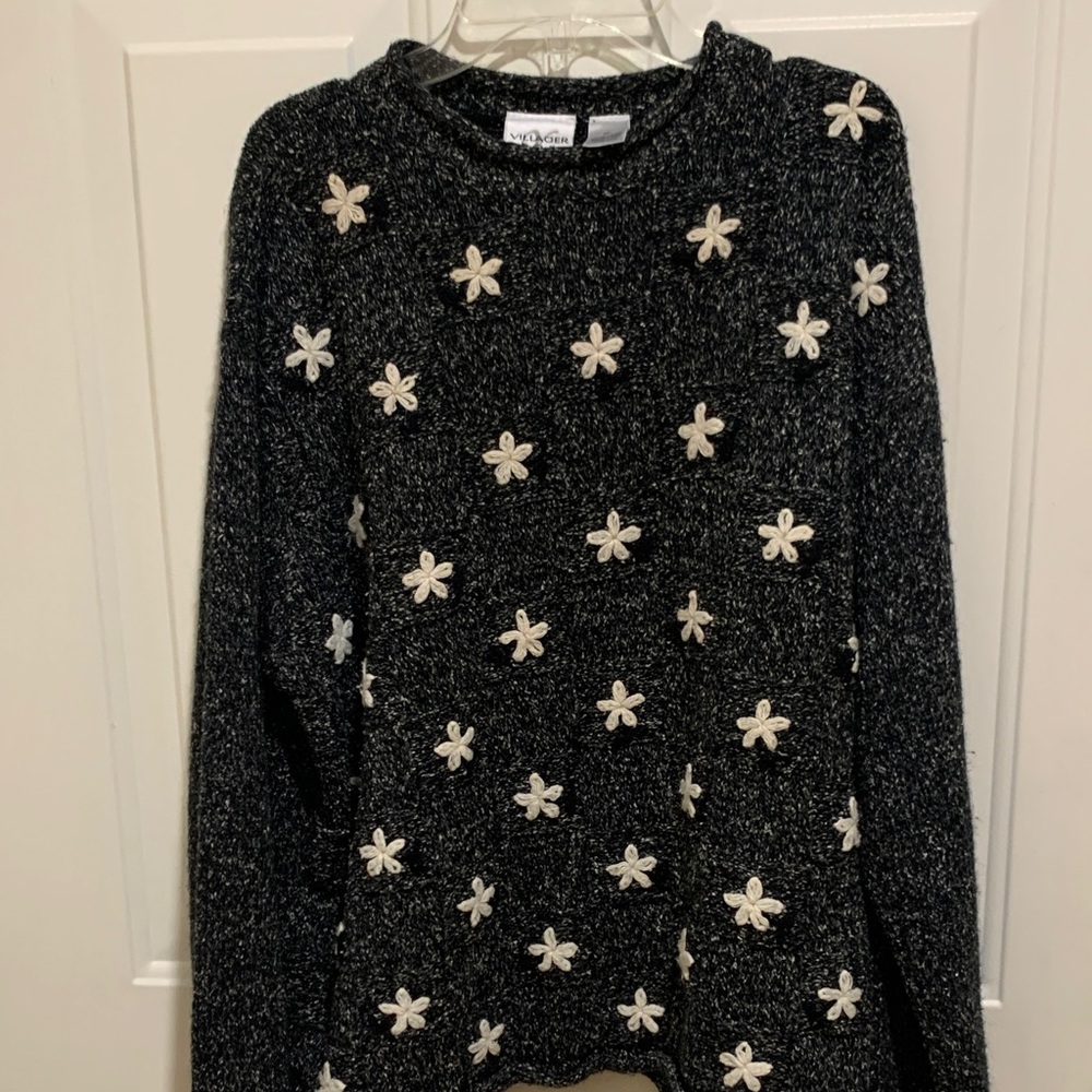 Chic Black Sweater with Cream Floral Details